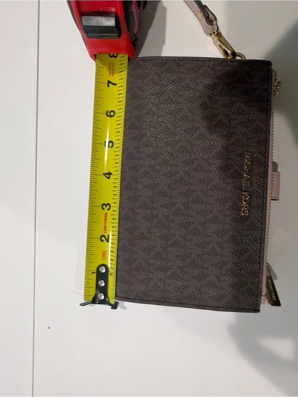 Michael Kors Brown Signature Wristlet with Pink Trim